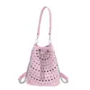 Bolso de Mano Transfronterizo de Moda Estilo Punk para Mujer, Nuevo Bolso Cubo Versátil, Bolso Personalizado con Remaches, Bolso Cruzado de un Solo Hombro para Mujer