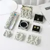 Caja de Regalo para Joyería en Stock con un Diseño Fresco y Elegante, Presentando un Empaque de Lazo para Pulseras, Colgantes y Collares