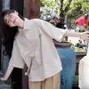 Camisa corta a rayas juvenil de verano para mujer, camisa casual holgada bordada de alta gama con un toque artístico