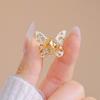 Broche de mariposa hueco con diamantes brillantes, pasador de seguridad anti-luz, decoración fija para cárdigan, bufanda
