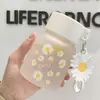 Taza de viaje de vidrio con diseño de margarita pequeña esmerilada de venta caliente transfronteriza, vaso de agua, taza de vidrio de lujo ligero de alta calidad, taza de café, logotipo