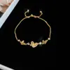 Colgante de Flor Hueca Ovalada de Corazón de Zircón Pulsera Deslizante Pulsera de Lujo Ligero de Gama Alta Pulsera de Moda Versátil