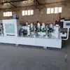 Máquina Molduradora de Marco de Puerta Integrada, Máquina Ranuradora de Marco Escalonado Totalmente Automática, Máquina Molduradora de Panel de Marco de Puerta con Adhesivo Termofusible, Máquina Ranuradora Termofusible