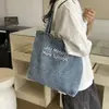 Bolso de lona de mezclilla estilo americano vintage, bolso de hombro bordado de gran capacidad, bolso de mano versátil para estudiantes y para ir al trabajo
