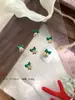 Promoção de Venda Sino de Natal Acessórios para Nail Art Laço Liga de Ouro e Prata Exquisite Estilo Levemente Luxuoso Decoração de Unha Usável Venda por Atacado