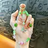 Cadena para teléfono móvil con lazo de aleación con cuentas, llavero, colgante, funda de teléfono móvil, correa de muñeca, accesorios para bolso, regalo pequeño, venta al por mayor