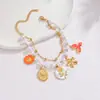 Pulsera de Perlas Estilo Nuevo Retro Europeo y Americano Colgante de Acero Inoxidable Corazón Estrella Joyería de Lujo Ligero de Gama Alta Venta al por Mayor