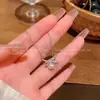 Collar de perlas con lazo estilo coreano para mujer, versátil y único, cadena para clavícula de acero de titanio, accesorio elegante para chicas a la moda, venta al por mayor
