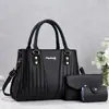 2026 Nova Moda Retrô Bolsa Tecida em Relevo Mãe-Filho Bolsa de Mão Grande Capacidade para o Dia a Dia da Mulher Bolsa de Ombro Venda por Atacado Transfronteiriça