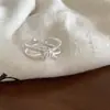 Anillo de cinta moderno y sencillo para mujer, de doble capa, lujo ligero, lazo entrelazado, anillo ajustable, nudo abierto personalizado, producto nuevo