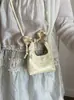 Bolso pequeño dulce y lindo para mujer, nuevo bolso de mano versátil estilo coreano para lápiz labial y monedas, adecuado para citas, bolso de hombro o cruzado, transfronterizo