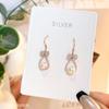 Pendientes de plata de ley S925 para mujer, elegantes y a la moda, con lazo, de alta calidad y personalidad, que combinan con todo, con circonitas jóvenes y perlas.