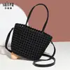 Cesta de Legumes 2025 Nova Francesa de Nicho High-end Bolsa de Mão Trançada Artesanal Bolsa de Ombro Versátil