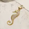 Bestseller Transfronterizo Aogu Estilo Oceánico Chapado en Cobre Oro Real Zirconia Colgante de Caballito de Mar Collar para Mujeres, Cadena de Clavícula de Nicho