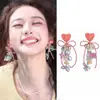 Nuevos Pendientes Chinos de Flor Rosa con Borlas Exagerados Clavos de Oreja Lujo Ligero de Gama Alta Atmosféricos Colgantes de Oreja Pendientes de Novia para Mujer