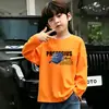 Camiseta de manga larga de algodón puro para niños 2026 primavera y otoño camiseta de dibujos animados para niños niño pequeño bebé moda camiseta básica
