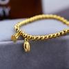 Acero de titanio Oro de 18 quilates estilo chino nuevo estilo nacional semilla de loto pulsera de semilla de loto femenina no se decolora dos mundo feliz cuentas redondas pulsera elástica