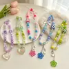 Cadena de cuentas de colores dopamina de moda para teléfono con colgantes de corazón y flor de acrílico para bolsos y cámaras de niñas