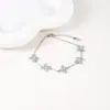 Pulsera de Trébol de Cuatro Hojas con Circones Microincrustados Cruzados para Mujer, Versátil, Nicho, de Alta Gama, Regalo para Novia, Diseño de Pulsera