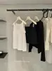 Y.JIA Conjunto de cárdigan de manga larga estilo coreano para el otoño con protección solar + top de tirantes con cuello en V + falda de cintura alta 1352