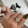 Anillo abierto vintage femenino plata francés negro elegante corte flor nicho sin colisión Perla envejecida estilo Hepburn