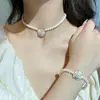 Collar de Perlas de Imitación Camelia Lujo Ligero Sentido de Diseño Nicho Nuevo Estilo 2025 Cadena para el Cuello Cadena para la Clavícula de Viento Frío de Verano para Mujeres