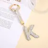 Chaveiro de Letra Inglesa Totalmente Cravejado de Diamantes Transfronteiriço Corda de Diamante Exquisita Chaveiro de Carro Pingente de Bolsa de Luxo Leve de Alta Qualidade