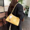Bolso de mano estilo coreano para mujer, bolso tote simple y elegante para el día a día de dama, bolso de hombro moderno y versátil para el trabajo.