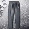 Pantalones casuales para hombre, de seda de hielo, finos, de secado rápido, deportivos, holgados, de talla grande, de primavera y otoño, de pierna recta.