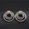 Pendientes Redondos Brillantes de Aguja Plateada Transfronterizos Europeos y Americanos Pendientes de Botón de Lujo Ligero de Gama Alta Pendientes para Mujer con Sentido de Diseño Nicho