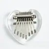 Mini piano de pulgar de 8 tonos de cristal pequeño lindo fácil de llevar mini colgante de celebridad de internet mini instrumento musical al por mayor
