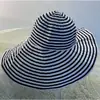 Chapéu de pescador listrado preto e branco novo transfronteiriço chapéu de sol dobrável de verão para mulheres chapéu de sol de aba larga estiloso chapéu bucket