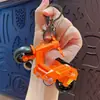 Pingente criativo de chaveiro de patinete elétrico de fricção, brinquedo divertido para aliviar o estresse de estudantes, presente para máquina de pegar bichos atacado