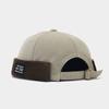 Otoño e Invierno nuevo color retro a juego gorro Yupi sin ala para hombre parche moderno gorro plano para mujer sombrero melón artístico