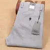 Pantalones casuales de lino nuevos de primavera para hombre, verano, material fino de algodón y lino, absorbentes de sudor, transpirables, rectos, elásticos, pantalones de vestir para hombre