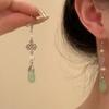 Pendientes de borla de jade esmeralda flósculo de alta gama estilo nacional jade para mujer pendientes de nicho de lujo ligero de alta gama pendientes cheongsam