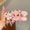 Diadema de tela con diseño de conejito de dibujos animados y flor, con dientes, antideslizante, adecuada para niños, versátil, no daña el cabello, accesorio para el cabello