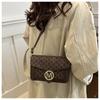 Bolso de moda de estilo coreano para mujer, novedad de 2024, bolso cuadrado pequeño retro combinable, bolso bandolera de hombro de diseño nicho de alta gama.
