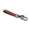 Chaveiro de Carro Transfronteiriço Simples para Cintura Masculina Criativo com Logo Gravado Pingente Anti-perda Chaveiro de Pelo