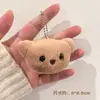 Colgante de peluche juguete pequeño llavero decoración de bolso restaurante llave de coche regalo pequeño regalo de graduación