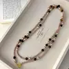 Collar de Cadena para Suéter Apilada de Perlas Maillard con Piedra Natural Ojo de Tigre Largo de Invierno para Mujer Lujo Accesible Gama Alta Elegante