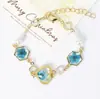 Pulsera de Resina con Flores Secas de Flor de Cerezo Chapada en Cobre Color Oro Real Joyería Conservadora de Color Mariposa Perla Pulsera Exquisita Planta