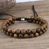Pulsera popular retro étnica europea y americana de cuentas de madera tejida a mano, doble capa de cuentas entrelazadas, pulsera de plata del Tíbet para mujer