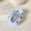 Nueva colección de pinzas de abulón con diseños florales y de lunares, pinzas de tiburón versátiles para el uso diario en la parte posterior de la cabeza, pinzas de garra ovaladas retro que no dejan marcas en la cabeza