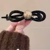 Lazo Elegante Perla Pinza de Agarre de Una Palabra para Mujer 2024 Nuevo Sentido de Alta Gama Horquilla Torcida para el Cabello Parte Trasera de la Cabeza Pinza de Tiburón
