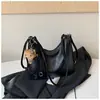 Bolso de mano retro de moda estilo coreano transfronterizo para mujer, nueva colección 2026, bolso de un solo hombro, bolso de trabajo, diseño de nicho, bolso tote retro