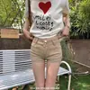 Shorts jeans ultra-curtos estilo retrô americano de cintura baixa que realçam o quadril para mulheres, novo estilo verão 2026, hot pants sexy de barra dobrada que afinam e abraçam o quadril