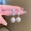 Pendientes de plata con forma de aguja francesa, con lazo de perla y flor de lujo, estilo vintage de alta gama, elegantes pendientes para mujer.