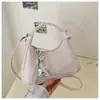 Bolso bandolera de diseño de nicho de alta gama para mujer, bolso de mano elegante y versátil, nuevo bolso casual de un solo hombro para el día a día 2026