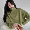 Suéter de cuello alto estilo coreano para mujer, con cuello de media cremallera, corte holgado y un estilo relajado y casual, perfecto para usar en otoño e invierno.